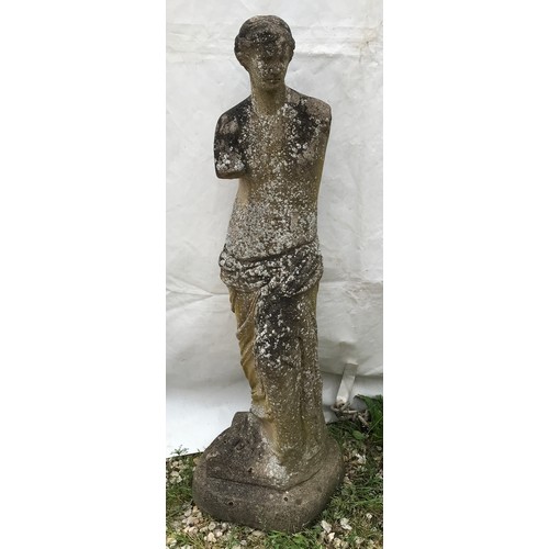 1557 - A reconstituted stone garden ornament of a lady. 96cms h x 30cms w at base x 25cms base length.