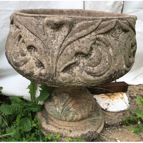 1559 - A pair of concrete garden urns with pedestal bases.