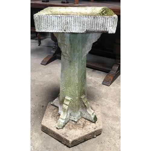 1564 - A concrete bird bath with square top and hexagonal base. 80cms h. Top width 39cms.