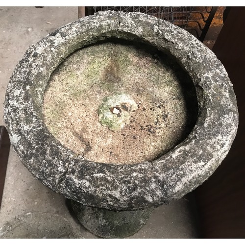 1566 - A concrete bird bath. 75cms h.