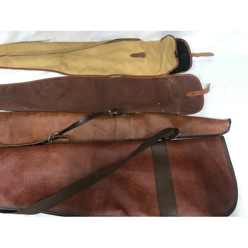 886 - Four gun cases, 2 brown leather, one fur lined, approx 120cms l and 2 canvas, 110cms and 115cms l.