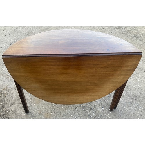 1358A - A demi-lune mahogany supper table. 105 x 107 cms x 72cms h. Leaf down 107 x 54cms.