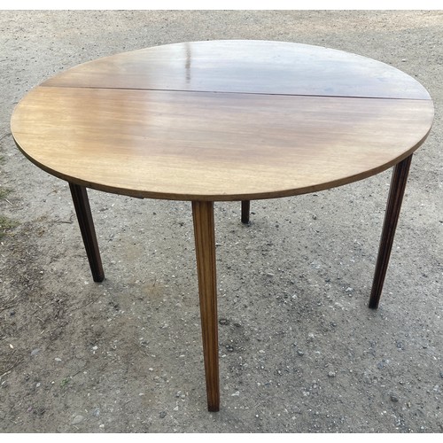 1358A - A demi-lune mahogany supper table. 105 x 107 cms x 72cms h. Leaf down 107 x 54cms.