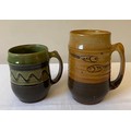 Two Pat Groom Winchcombe Pottery mugs. 15cms and 11.5cms h.