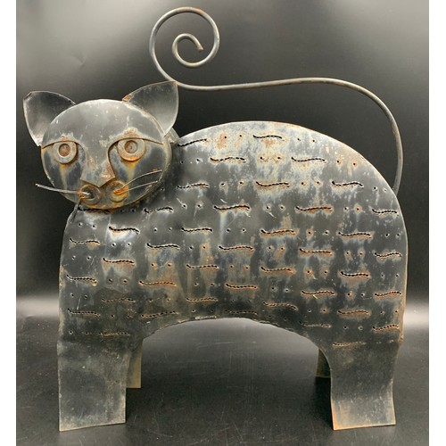 72 - A pierced metal cat candle holder with opening door to rear. 48 h x 42cms w.