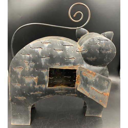 72 - A pierced metal cat candle holder with opening door to rear. 48 h x 42cms w.