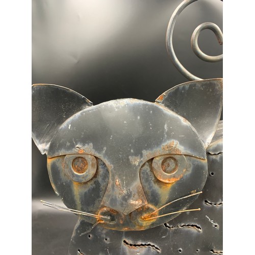 72 - A pierced metal cat candle holder with opening door to rear. 48 h x 42cms w.