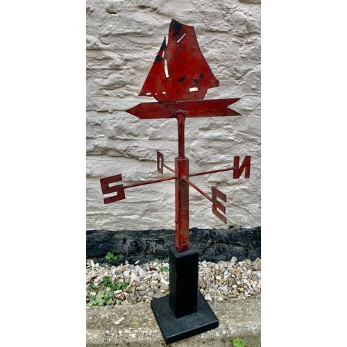 106 - Vintage metal sailing ship weather vane mounted on a wooden base. 81cms h.