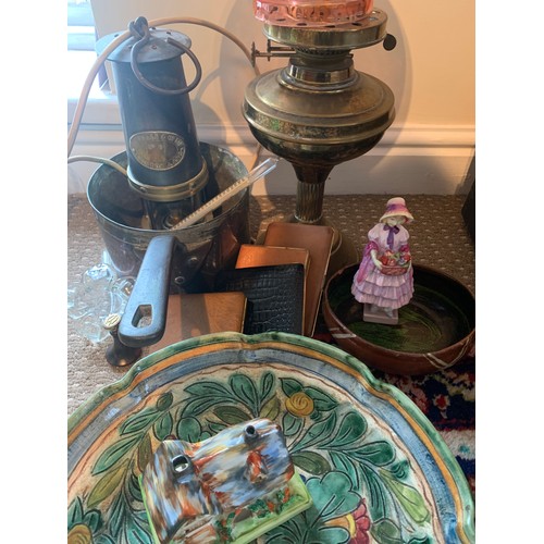 588 - A miscellany to include miners lamp, brass oil lamp, copper pan, Doulton figure, thermometer, cigare... 