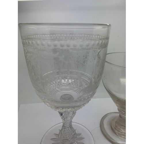 94 - Georgian glass rummer together with food quality cut and etched goblet. 17cms h.