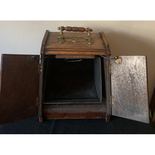 587 - A 19thc mahogany coal box with liner and brass fittings.