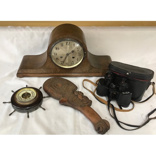 576 - A miscellany to include an oak mantle clock 52cms w x 25cms h, a ship's barometer 19cms w, a pair of... 