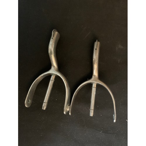 579 - A pair of swan neck cavalry boot spurs.