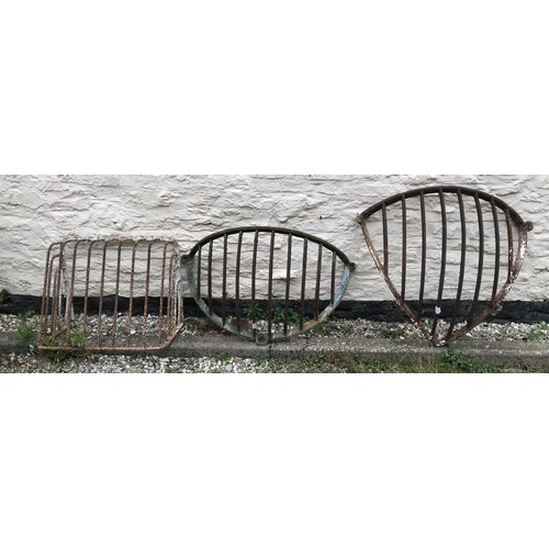 825 - Vintage metal hay racks, largest 96cms x 60cms.