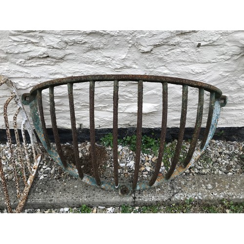 825 - Vintage metal hay racks, largest 96cms x 60cms.