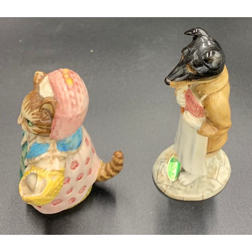 68 - A Beswick Beatrix Potter's Pickles with gold back stamp and original paper label together with Cousi... 