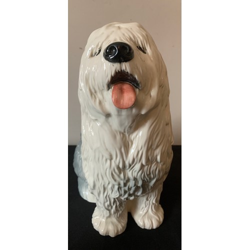 69 - A Beswick Old English Sheepdog. 30cms h.