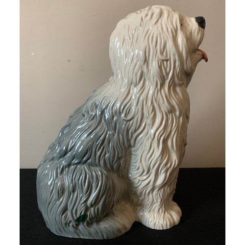 69 - A Beswick Old English Sheepdog. 30cms h.