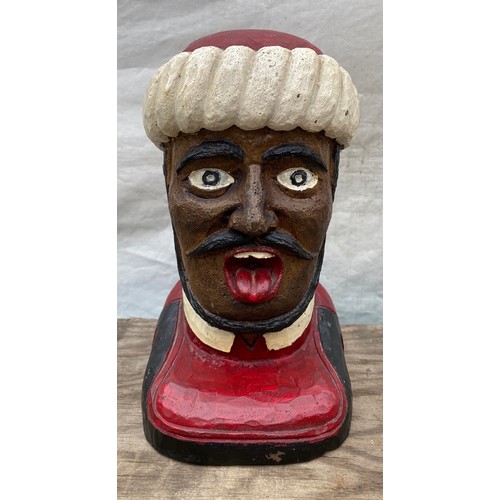 601 - A plaster chemist gaper display head. 25cms h. Inscribed to back Xanoria.