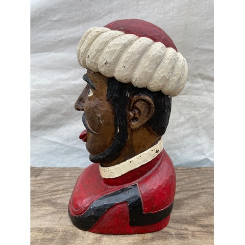 601 - A plaster chemist gaper display head. 25cms h. Inscribed to back Xanoria.