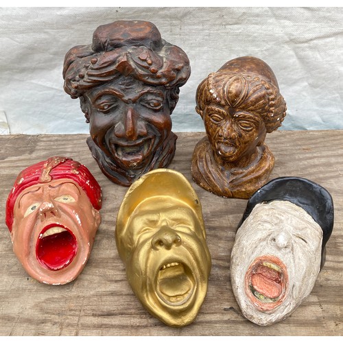 603 - Five plaster chemist gaper display heads. 20cms tallest.