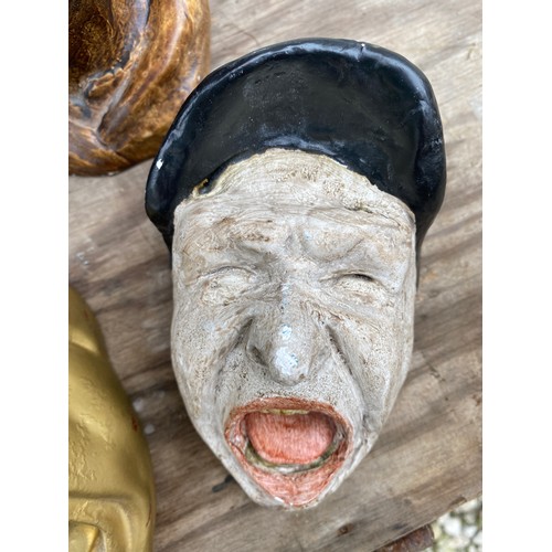 603 - Five plaster chemist gaper display heads. 20cms tallest.