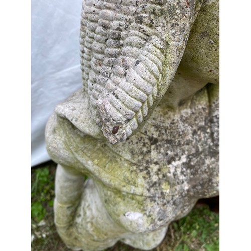 816 - A concrete Cleopatra garden statue. 85cms h.