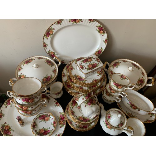 62 - A large quantity of Royal Albert Old Country Roses dinner and tea services comprising: 5 x 26 cms d ... 