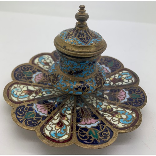 560 - A brass and enamel champlevé  inkwell 7.5cms h with glass liner.