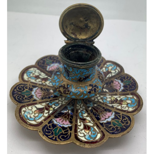 560 - A brass and enamel champlevé  inkwell 7.5cms h with glass liner.