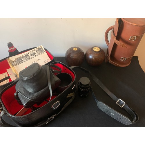 590 - A miscellany to include a cased Miranda camera, lens etc and cased wooden bowls.