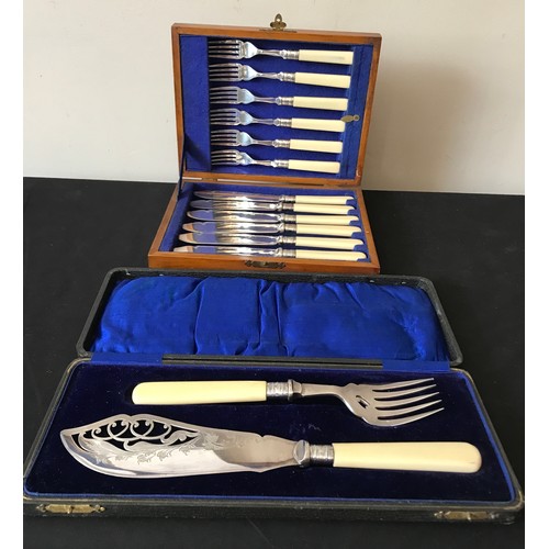 592 - A boxed pair of silver plated fish servers with silver ferrules together with a box of eight EPNS fi... 