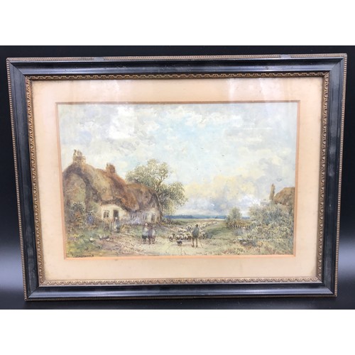 697 - Framed watercolour signed W Manners. Thatched Country Cottage scene with figures and sheep, picture ... 