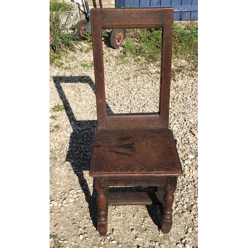 770 - An 18thc oak nun's chair from Rise Convent. Height to seat 40cms, height to back 87cms, width 35cms.