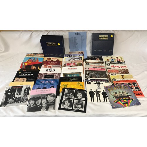 668 - The Beatles singles collection box set, 26 vinyl 44rpm and The Beatles E.P. collection box set of 15... 