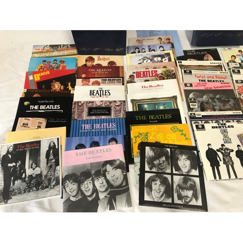 668 - The Beatles singles collection box set, 26 vinyl 44rpm and The Beatles E.P. collection box set of 15... 