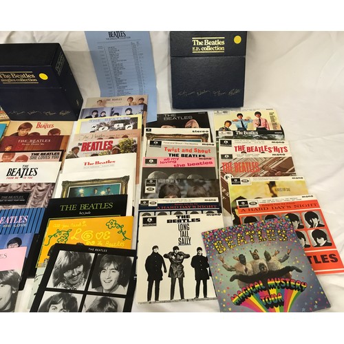 668 - The Beatles singles collection box set, 26 vinyl 44rpm and The Beatles E.P. collection box set of 15... 