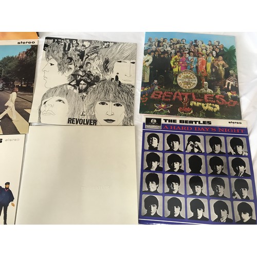 669 - The Beatles LP collection, 13 vinyl LPs with posters, blue presentation box. Parlaphone, facsimile s... 