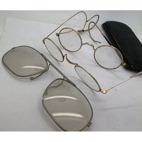 606 - Three pairs of vintage spectacles, including 2 yellow metal.