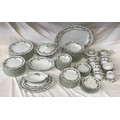 A Noritake dinner service comprising 90 pieces : meat plate 52cms, tureen, dinner plates 25.5cms x 1... 