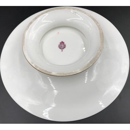 10 - A Royal Worcester pedestal dish with floral and butterfly decoration. 23cms d x 5cms h.