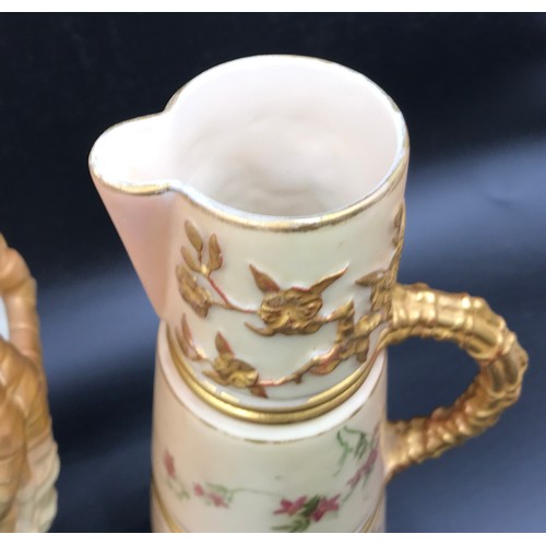 11 - A collection of Royal Worcester to include a basket vase 24cms h x 207cms w, tusk jug 20cms h, flora... 