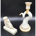 Two Royal Worcester candle sticks, Griffin 12.5cms h x 14 x 5cms at base and twisted cornucopia 20cm... 