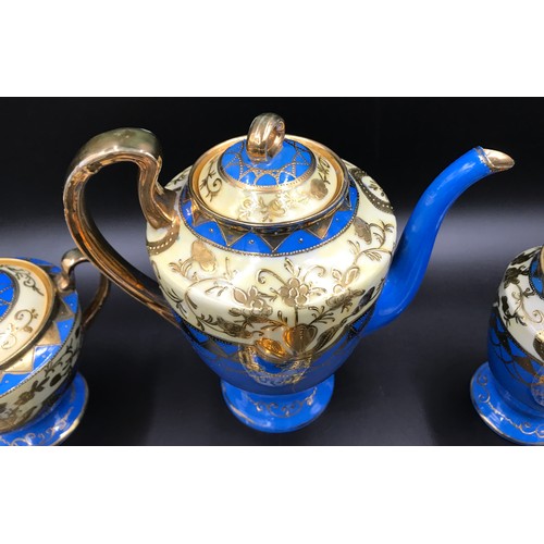 17 - A Japanese Samurai China 15 piece coffee set with blue ground and gilt decoration. Coffee Pot 18cms ... 