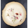 A Royal Worcester decorative pedestal plate with floral and butterfly decoration. 21.5cms d x 7.5cms... 