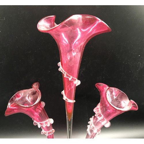 109 - A ruby glass epergne with 3 flutes. 44cms h x 26cms w at base.