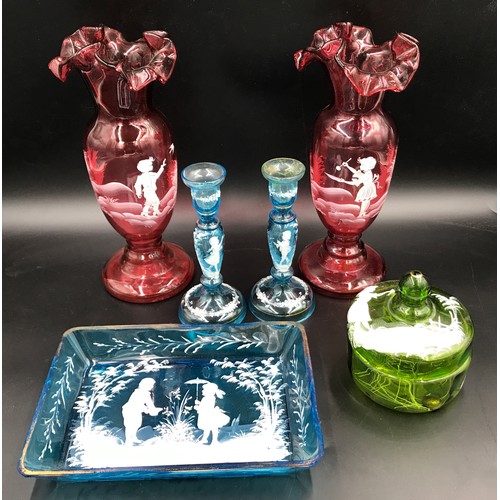 110 - A selection of Mary  Gregory glass ware  comprising: a pair of ruby vases with flared rims 28.5cms h... 