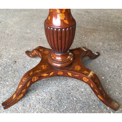 741 - A fine quality Victorian walnut inlaid fold over card table with reeded single pedestal base on four... 