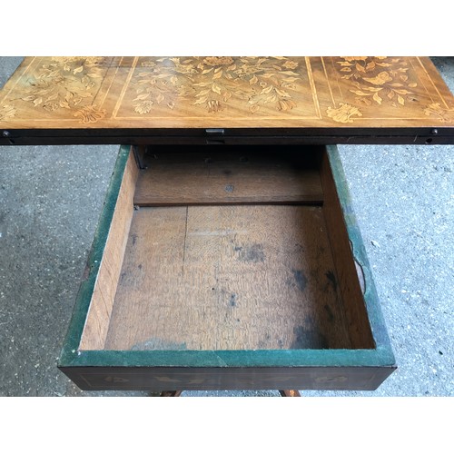 741 - A fine quality Victorian walnut inlaid fold over card table with reeded single pedestal base on four... 