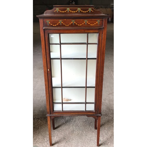 742 - An Edwardian mahogany inlaid display cabinet. Height to back 147cms x 59ms w x 30cms d. With key.